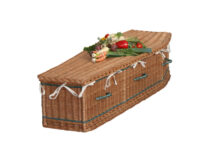 A wicker coffin on a white background